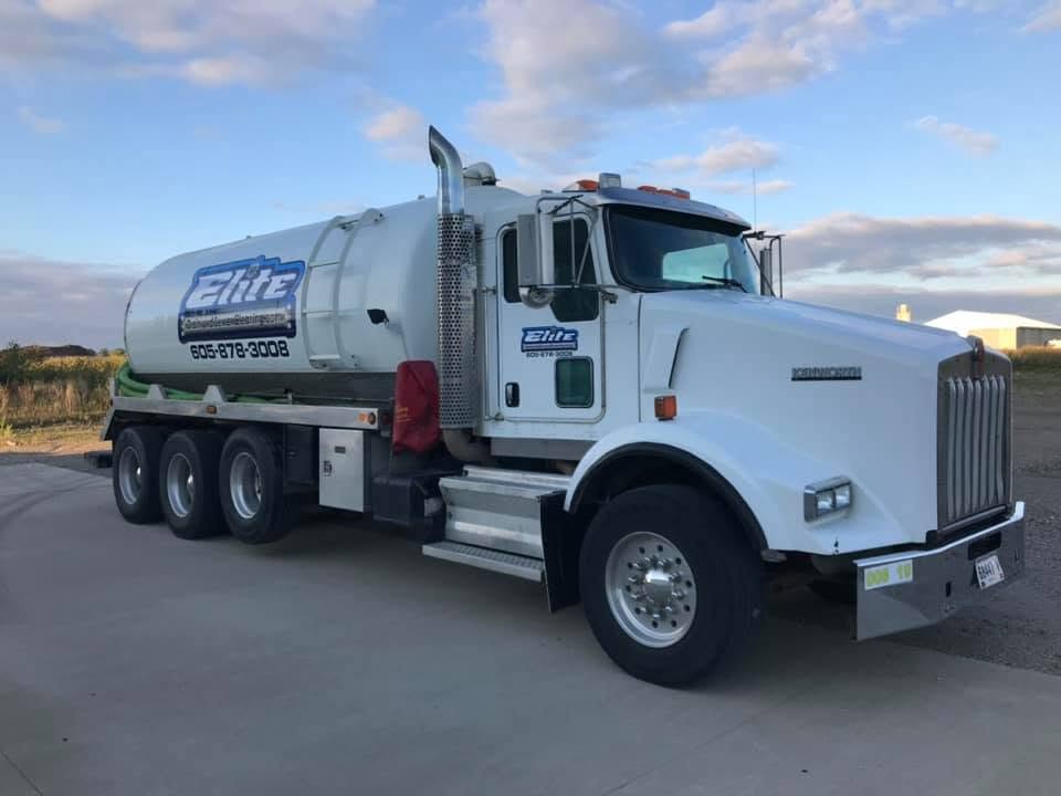 Elite septic pumping truck on site